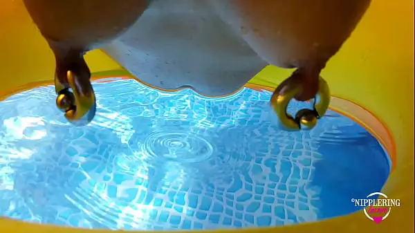 Topless In Swimming Pool