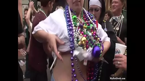 College Instructor Flashes At Mardi Gras